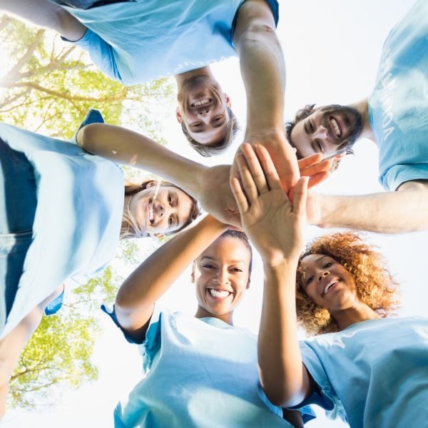 portrait-of-volunteer-group-forming-huddles.jpg